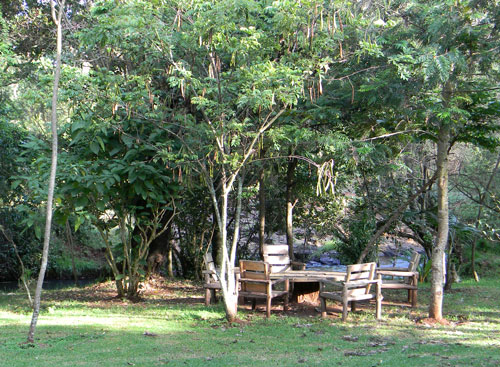 Outdoor seating area at Naiberi River Camp photo © by Michael Plagens