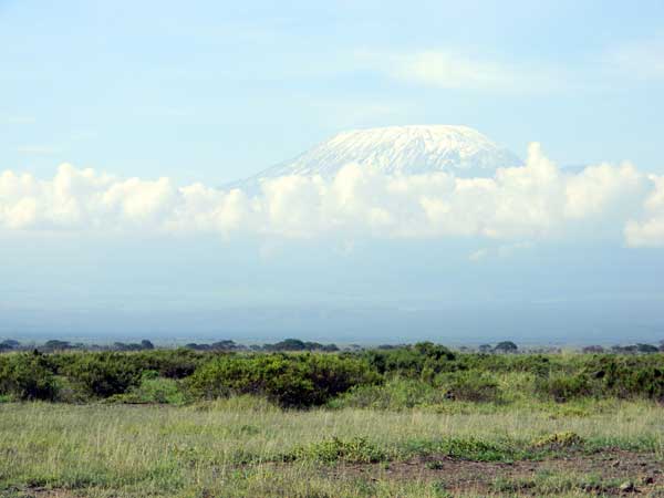 Kilimanjaro as seen from Amboseli, Kenya, photo © by Michael Plagens